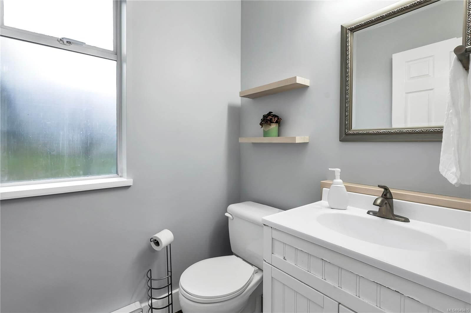 Modern bathroom with clean gray walls