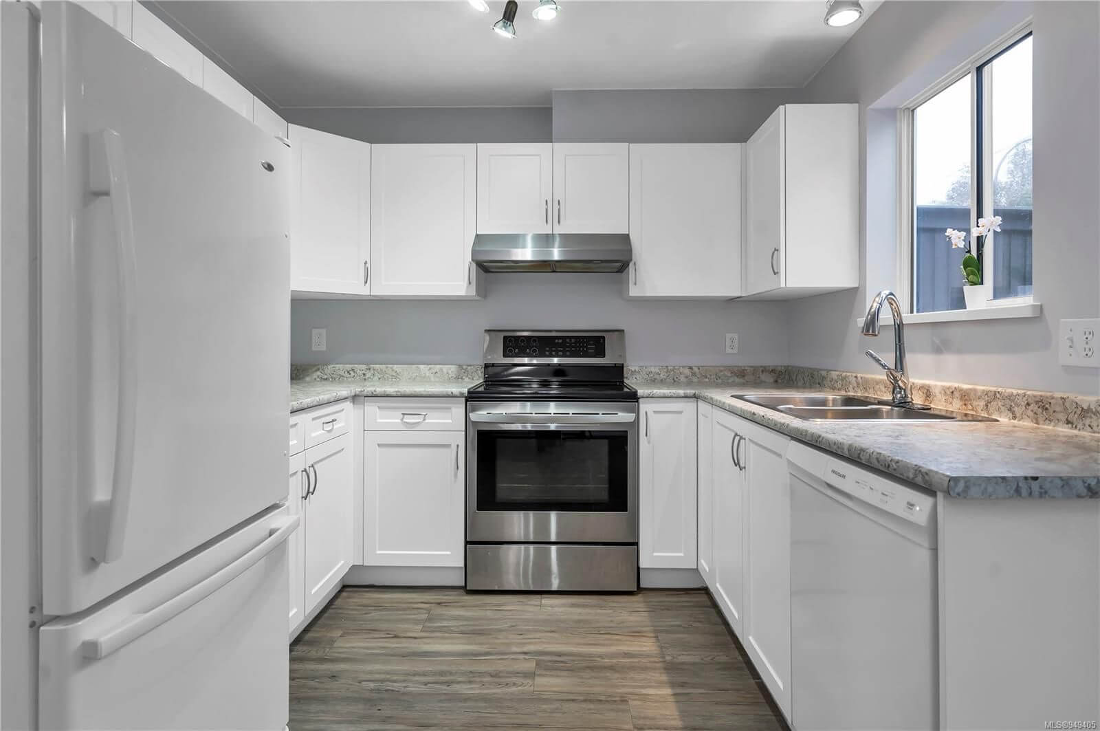 Full kitchen view with painted ceiling